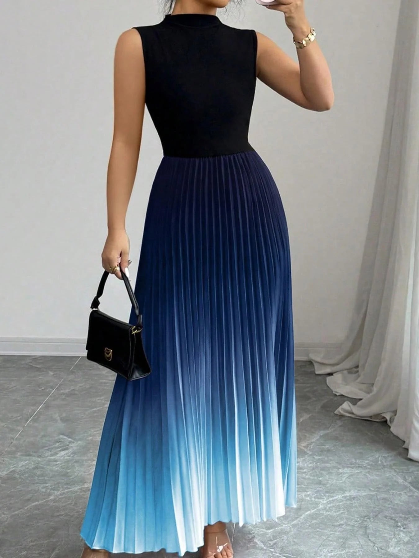 Sleeveless pleated maxi dress with an ombre effect and high neck